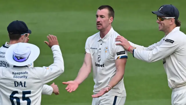 Blair Ticker celebrates wicket