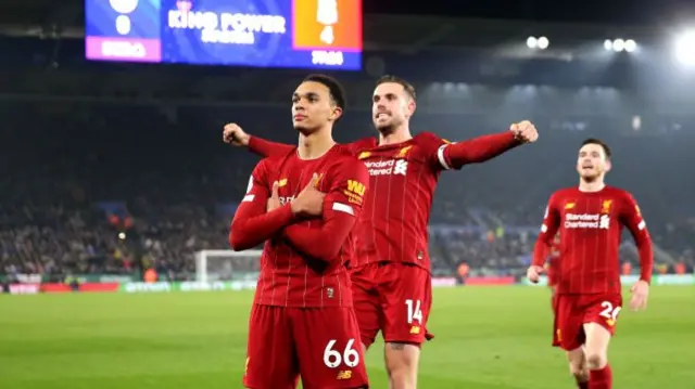 Trent Alexander-Arnold celebrates after scoring Liverpool's fourth goal against Leicester in December 2019