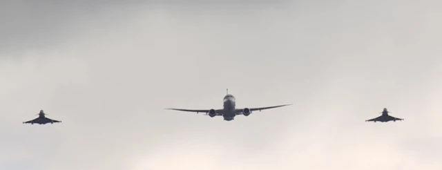 Flanked by two Typhoon jets, a Poseidon maritime patrol aircraft were part of the fly over