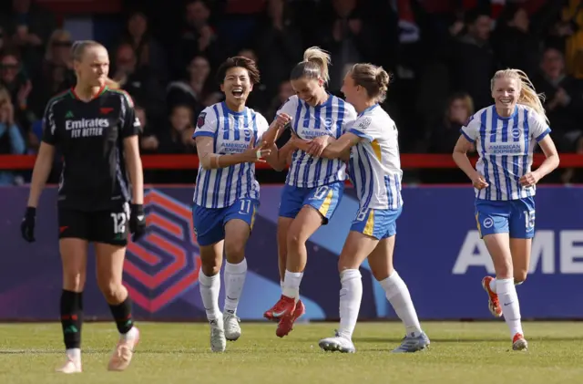 Brighton & Hove Albion's Jelena Cankovic celebrates with teammates after scoring their third goal