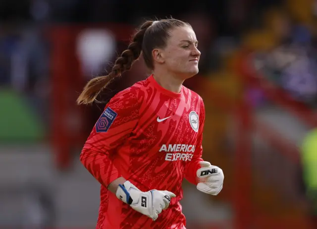 Brighton & Hove Albion's Sophie Baggaley reacts