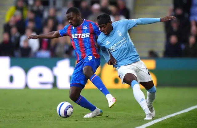 Crystal Palace's Tyrick Mitchell (left) and Nottingham Forest's Anthony Elanga battle for the ball