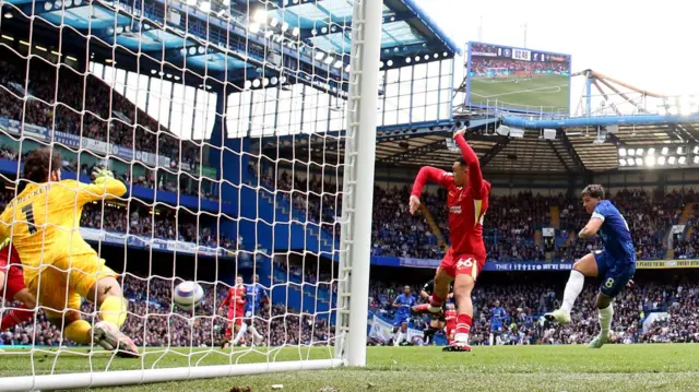 Enzo Fernandez scores Chelsea's opening goal in their win over Liverpool in May 2025
