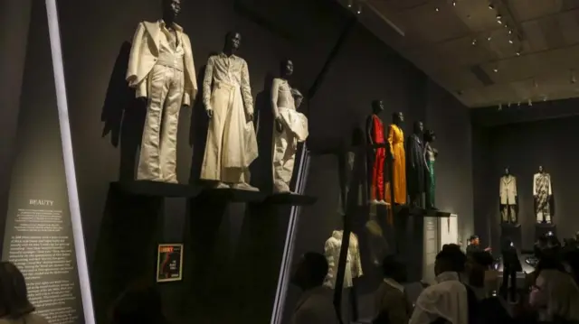 People view the fashion on display during the press preview for the opening of The Met's Costume Institute exhibition 'Superfine: Tailoring Black Style' at the Metropolitan Museum of Art in New York, New York, USA, 05 May 2025.