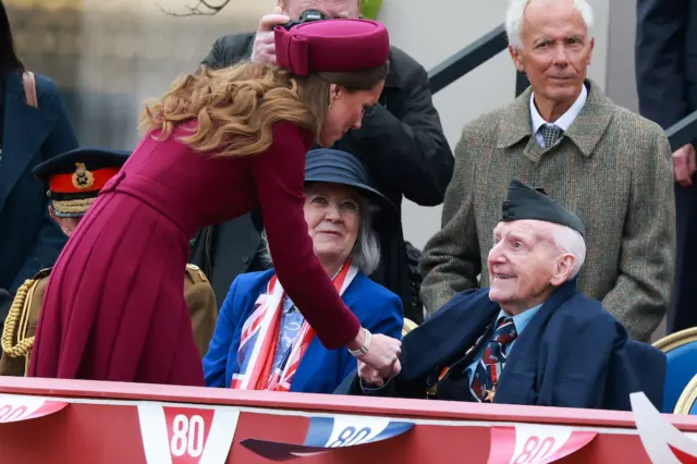 Catherine, Princess of Wales shakes hands with a veteran