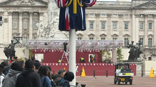 Crowds watch as stage removed in front of BP