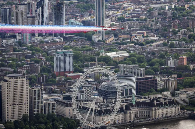 The Royal Air Force team flies past the London Eye