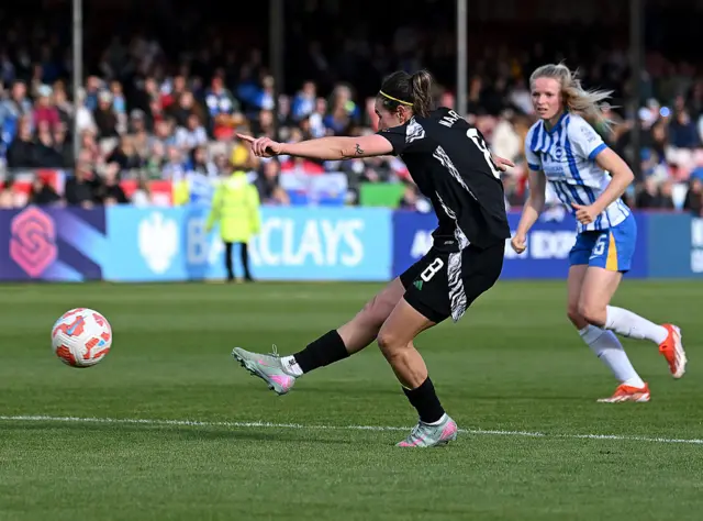 Mariona Caldentey of Arsenal scores her team's second goal during the Barclays Women's Super League match between Brighton & Hove Albion FC and Arsenal FC at Broadfield Stadium