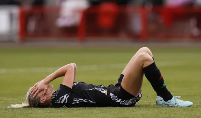 Arsenal's Leah Williamson reacts after sustaining an injury