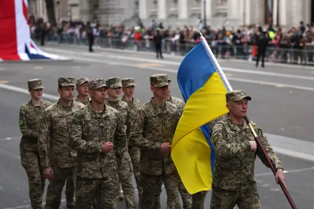 Members of the Ukrainian military take part in the military procession