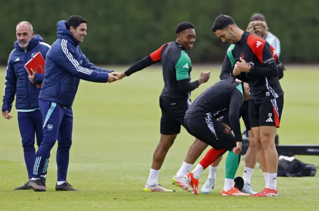 Mikel Arteta and Myles Lewis -Skelly