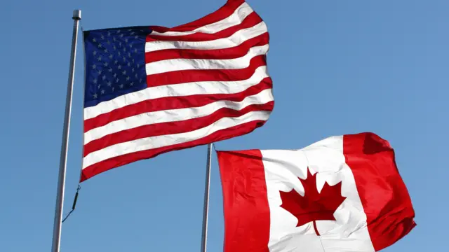 US and Canadian flags