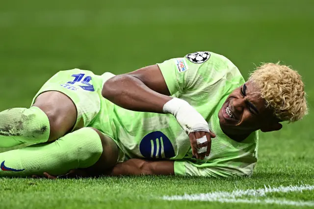 Lamine Yamal lays on the pitch