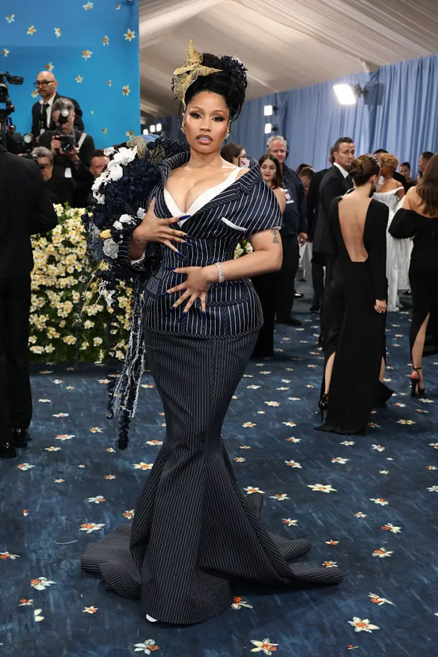 Rapper Nicki Minaj in black and purple gown