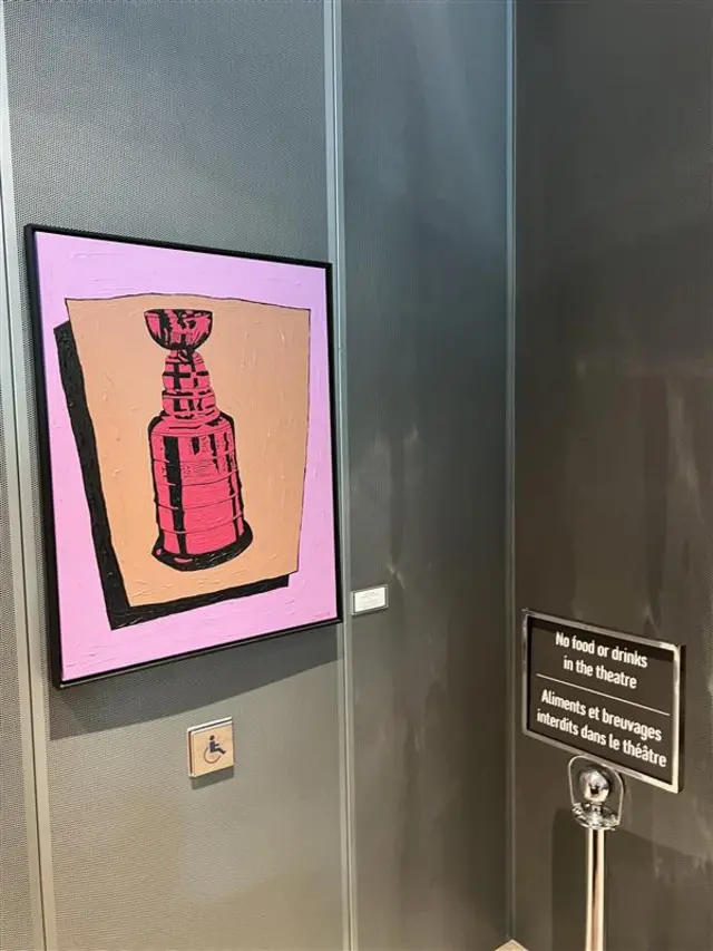 A picture of the Stanley Cup and a sign in English and French at the Canadian embassy in Washington, DC