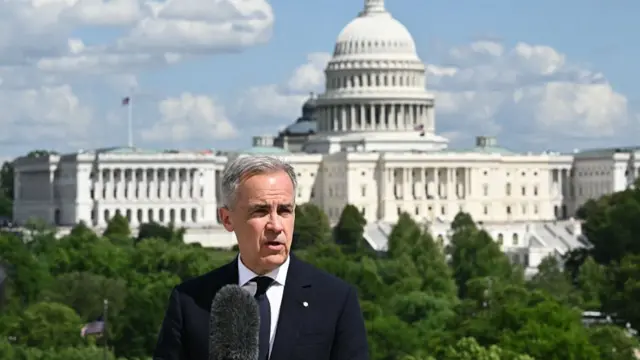 Canadian Prime Minister Mark Carney speaks to the media after a meeting with US President Donald Trump at the Embassy of Canada to the United States in Washington, DC