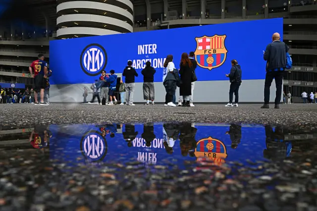 Supporters wait outside the stadium
