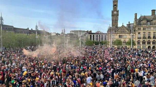 Crowd of fans celebrating in Centenary Square
