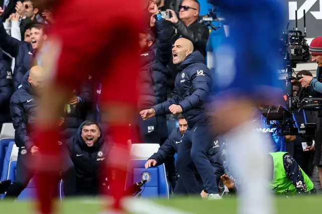 Enzo Maresca celebrates Chelsea's win against Liverpool.
