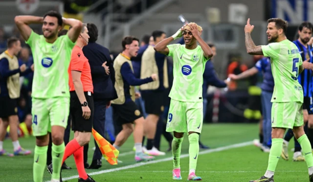FC Barcelona's Lamine Yamal with teammates react after a penalty is awarded to Inter Milan after a VAR review