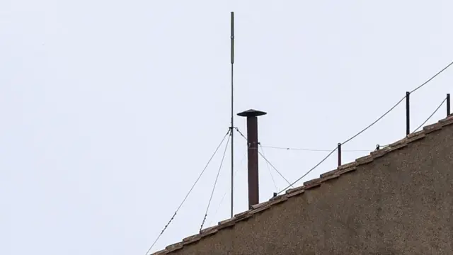 A view shows the chimney on the Sistine Chapel roof, as a conclave to elect the next pope takes place at the Vatican, as seen from Rome, Italy, May 7
