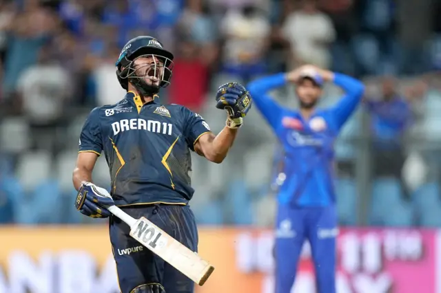 Arshad Khan celebrates win