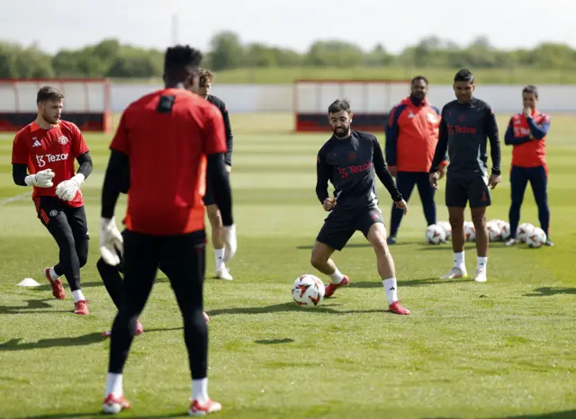 Manchester United's Bruno Fernandes with teammates
