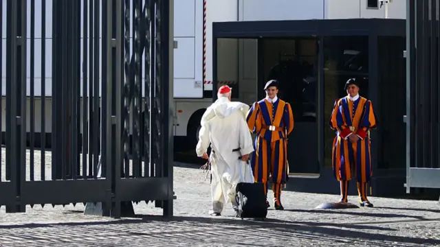 Cardinal Timothy Radcliffe arrives at St. Peter's Basilica a day ahead of the conclave
