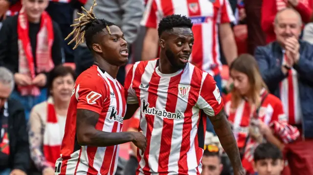 Nico Williams celebrates with Inaki Williams after scoring