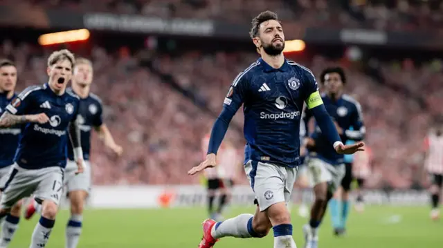 Bruno Fernandes of Manchester United scores their second goal from a penalty