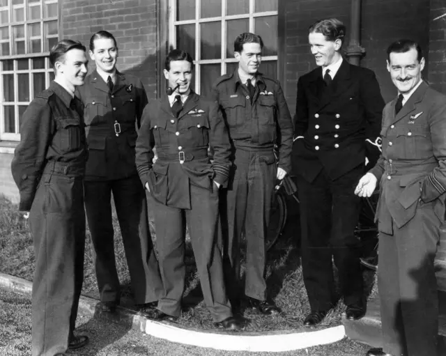 Archive photograph of Wing Cdr Guy Gibson, pictured with members of and members of his Lancaster bomber air crew.