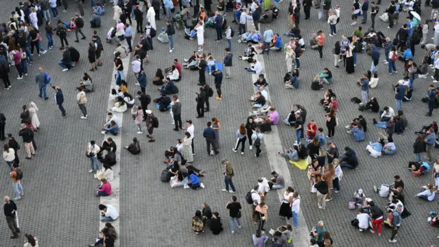People gather in St Peter's Square