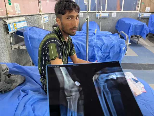 Eighteen-year-old Manzoor at a hospital in Uri