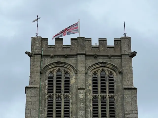 The union flag flies from a pole on top of Howden Minster