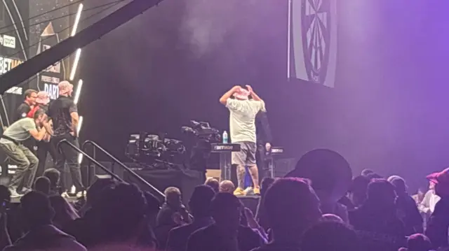 Darts fan Timmy celebrates winning a trip to Las Vegas