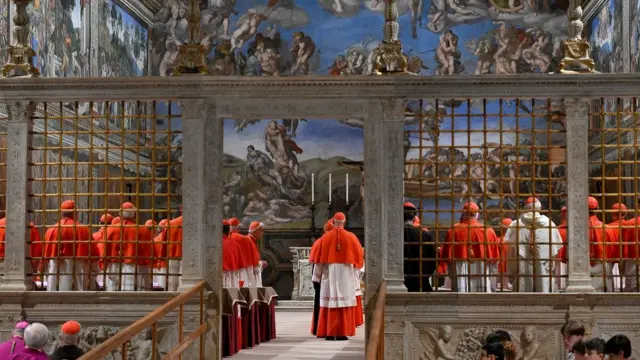 ardinals stand in the Sistine Chapel, ahead of the conclave to elect the next pope at the Vatican, May 7, 2025