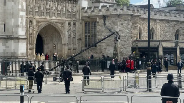 Crowd files out of Westminster Abbey as bells ring