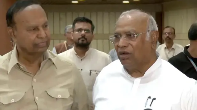 President of Congress party Mallikarjun Kharge speaks to the media