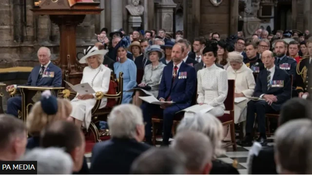 King Charles, Queen Camilla and senior royals sit with veterans and politicians inside Westminster Abbey
