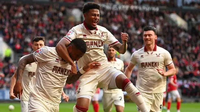 Sheffield United players celebrating scoring a goal