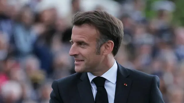 A file photo of Macron, as seen from the side