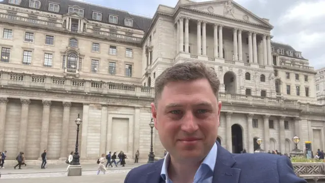 Business reporter Michael Race outside the Bank of England