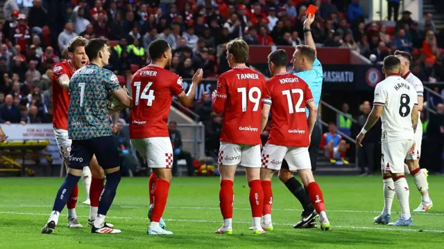 Rob Dickie shown red card