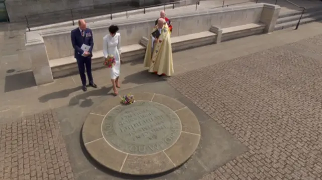 Prince William and Princess Catherine in front of the Innocent Victims' Memorial outside Westminster Abbey
