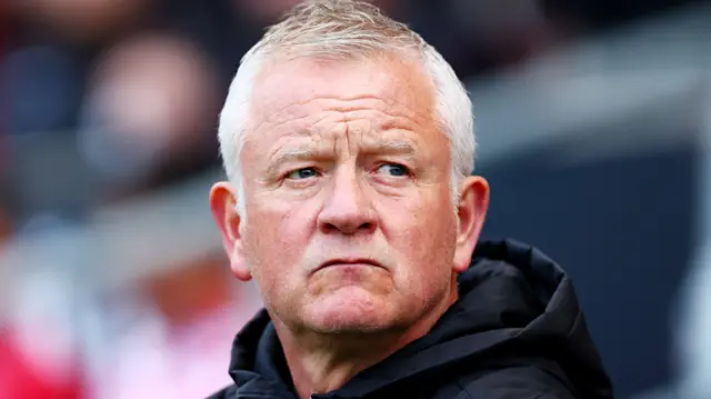 Chris Wilder looks on