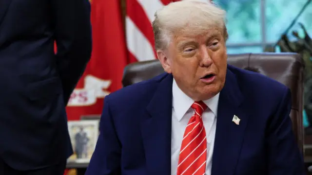 US President Donald Trump talks to reporters after announcing a tariff deal with the UK. Photo: 8 May 2025