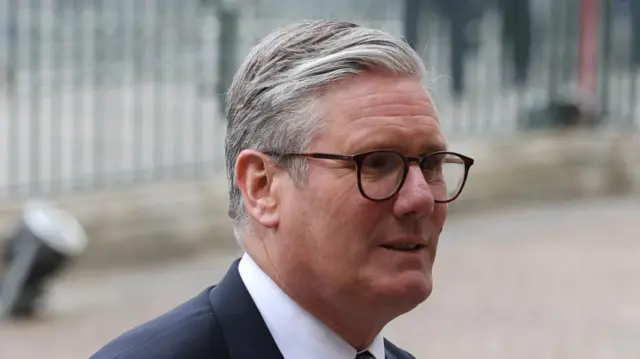 A file photo of Keir Starmer, he is walking in the street