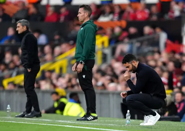 Manchester United manager Ruben Amorim (right) reacts on the touchline