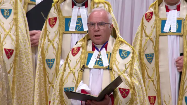 Dean of Westminster reads from the order of service