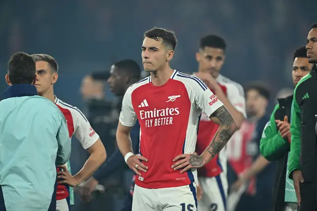 Arsenal players after defeat